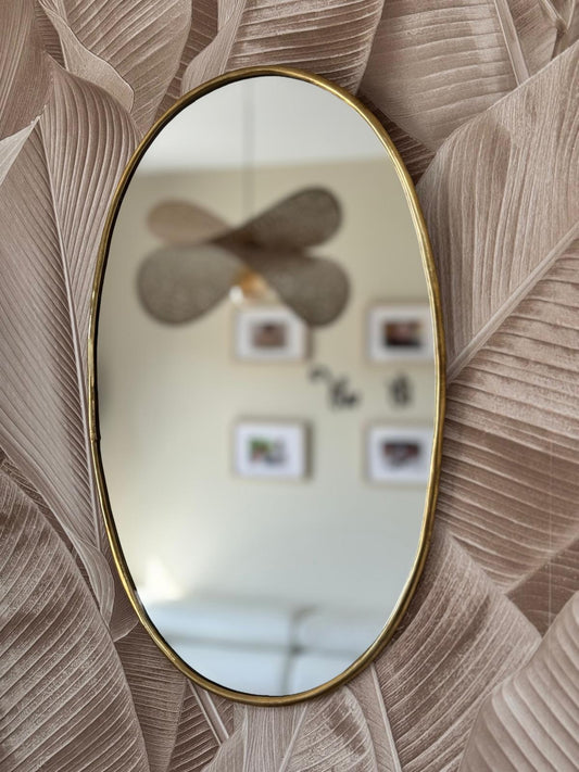 Miroir ovale en laiton